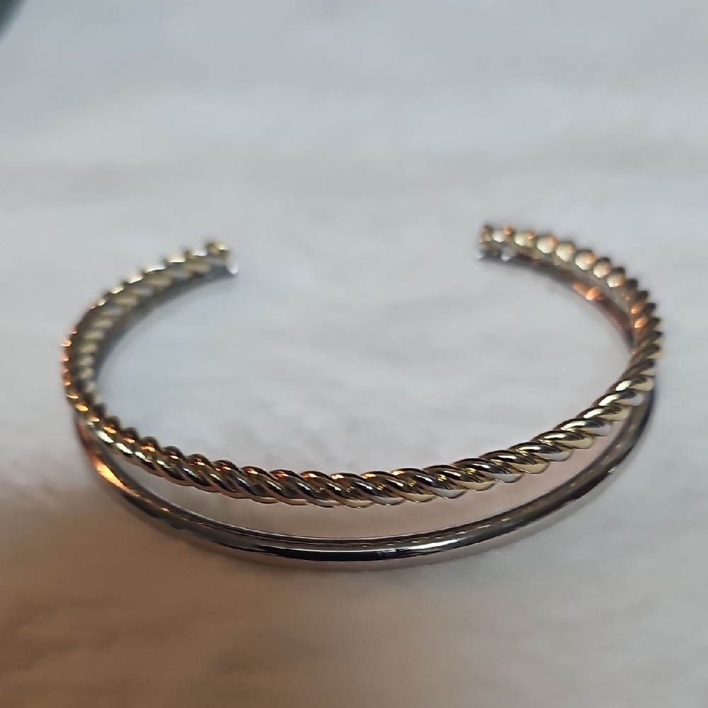 Elegant Gold and Silver Twisted Bracelet